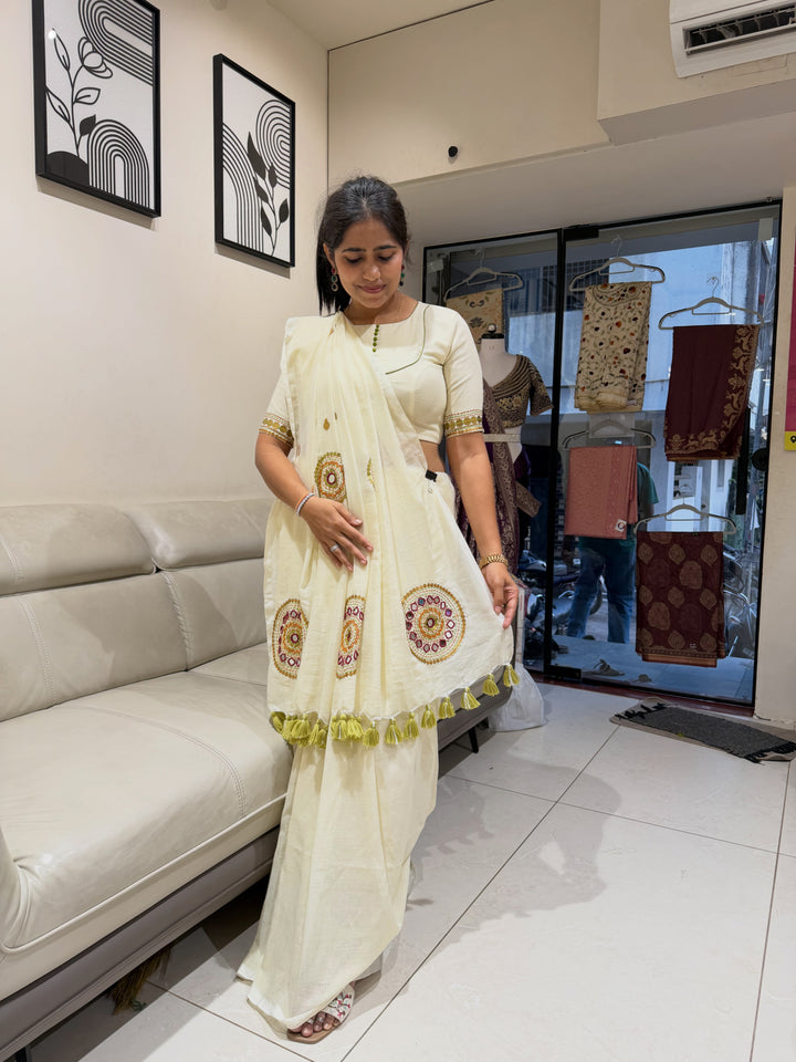 Ivory khadi cotton saree with hand stitched circular motifs and tassel edging - view 1