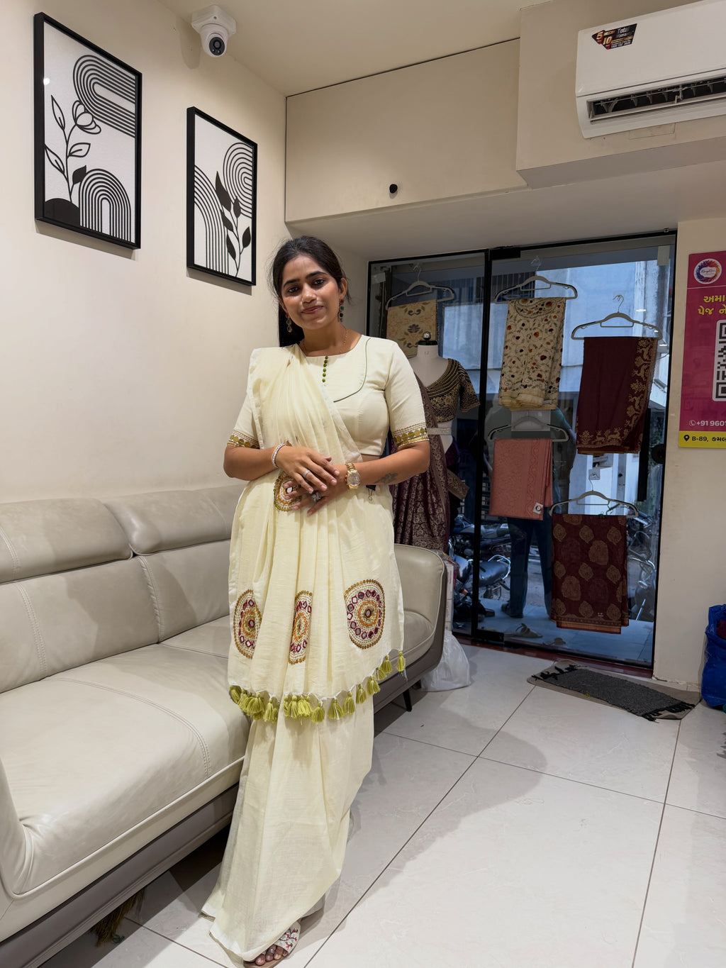 Ivory khadi cotton saree with hand stitched circular motifs and tassel edging - view 2