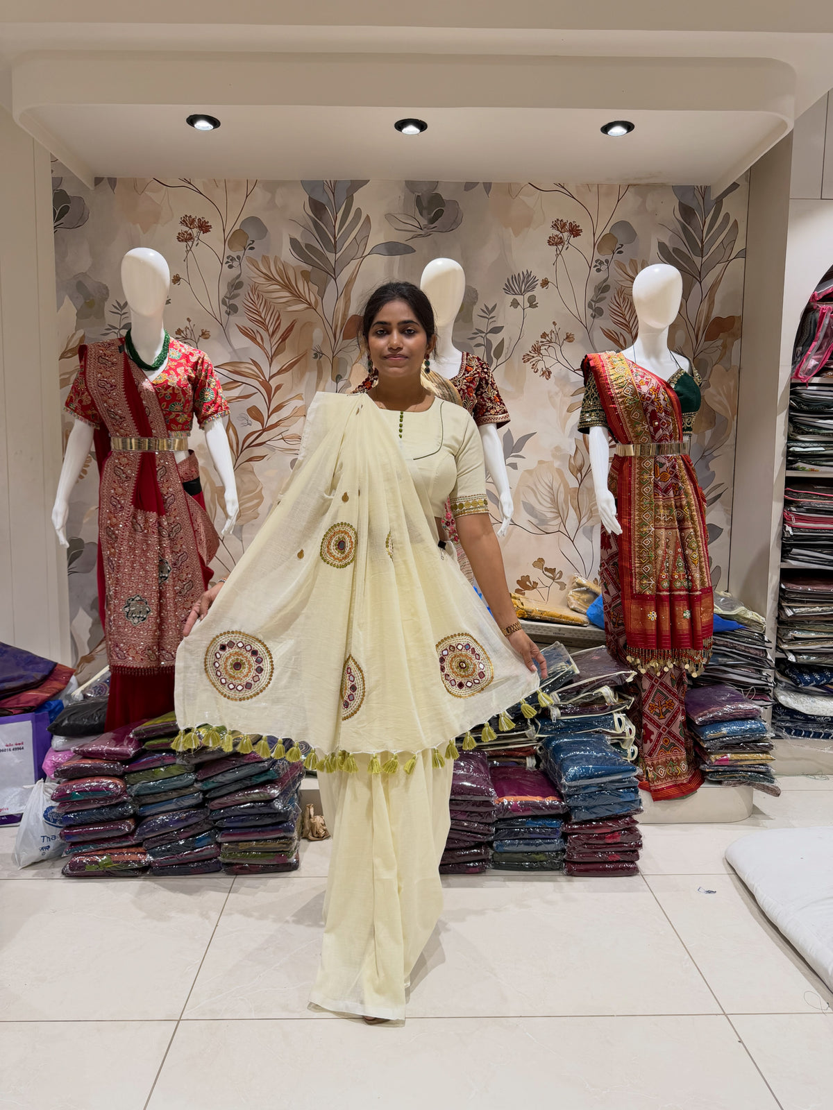 Ivory khadi cotton saree with hand stitched circular motifs and tassel edging - view 3