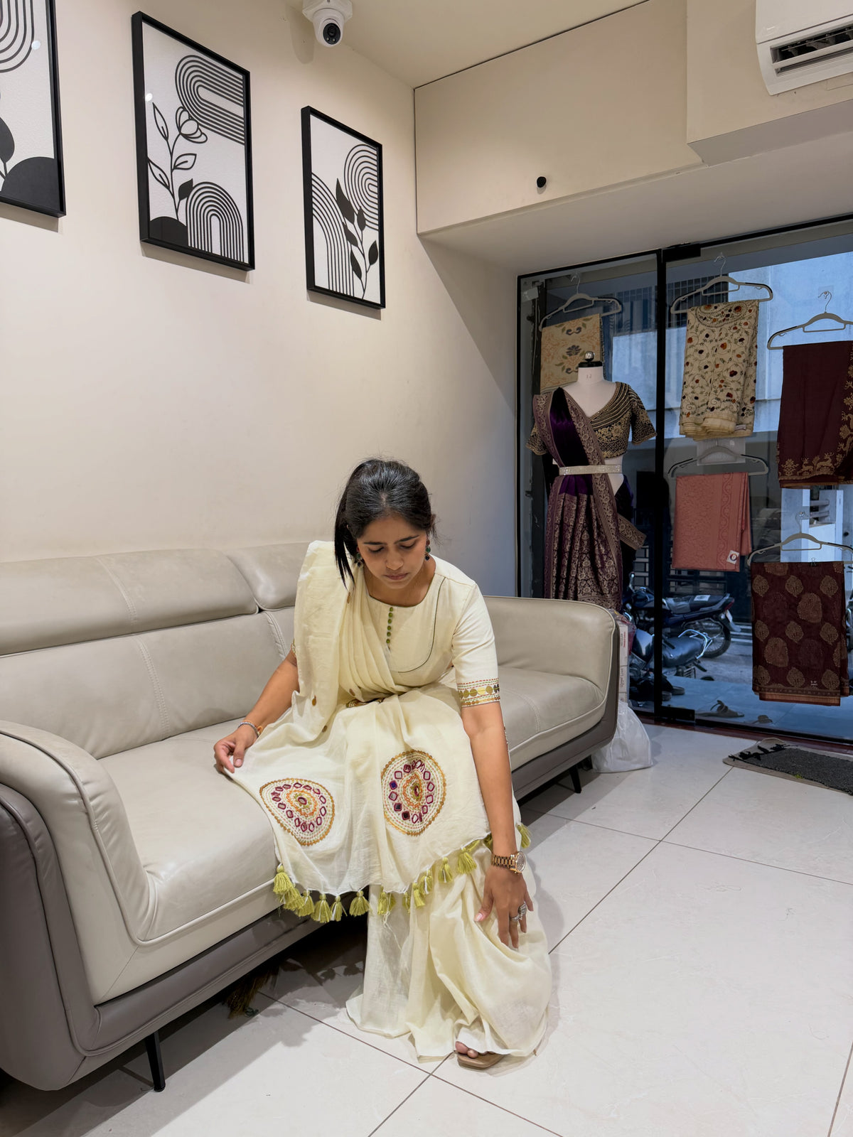 Ivory khadi cotton saree with hand stitched circular motifs and tassel edging - view 9