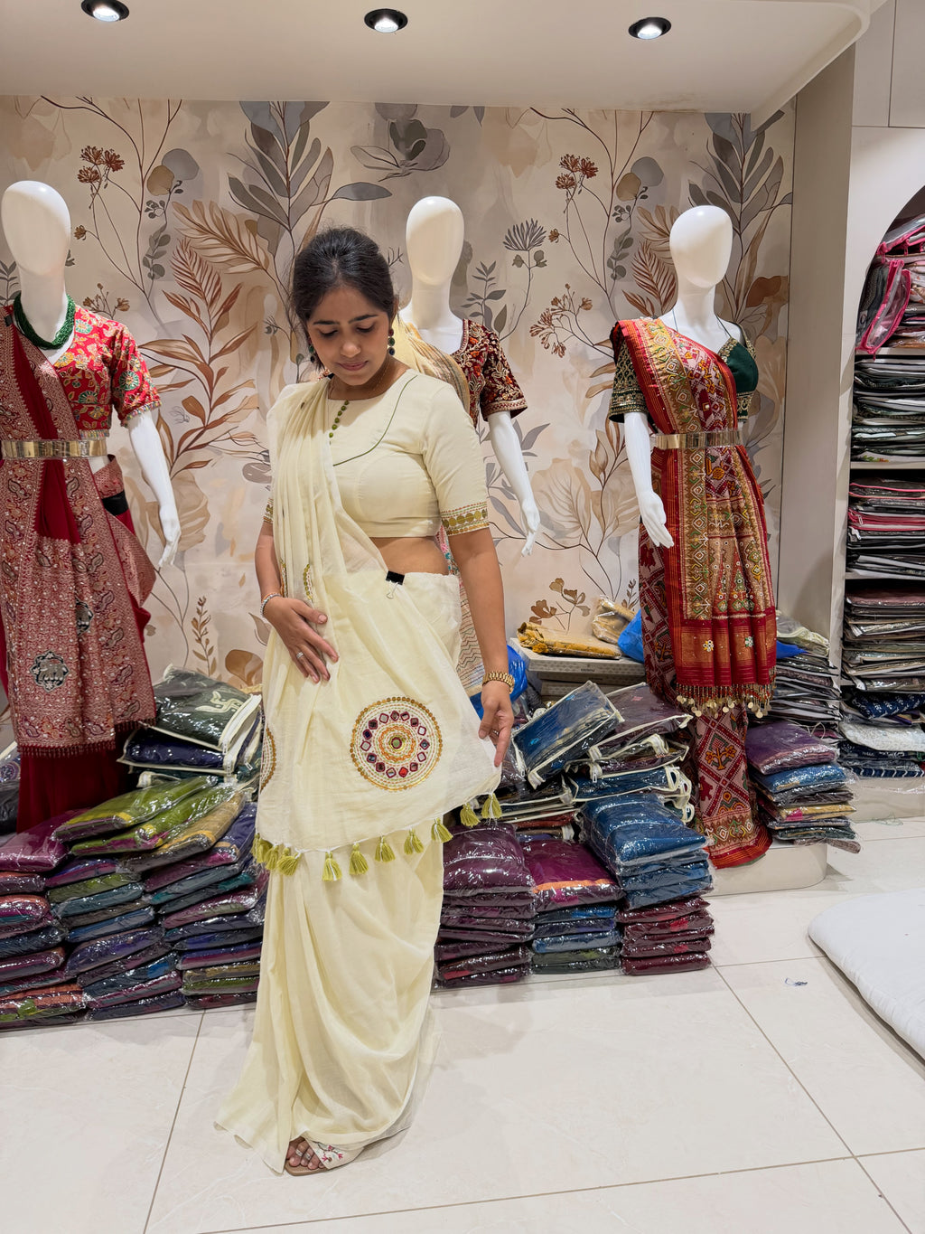 Ivory khadi cotton saree with hand stitched circular motifs and tassel edging - view 10