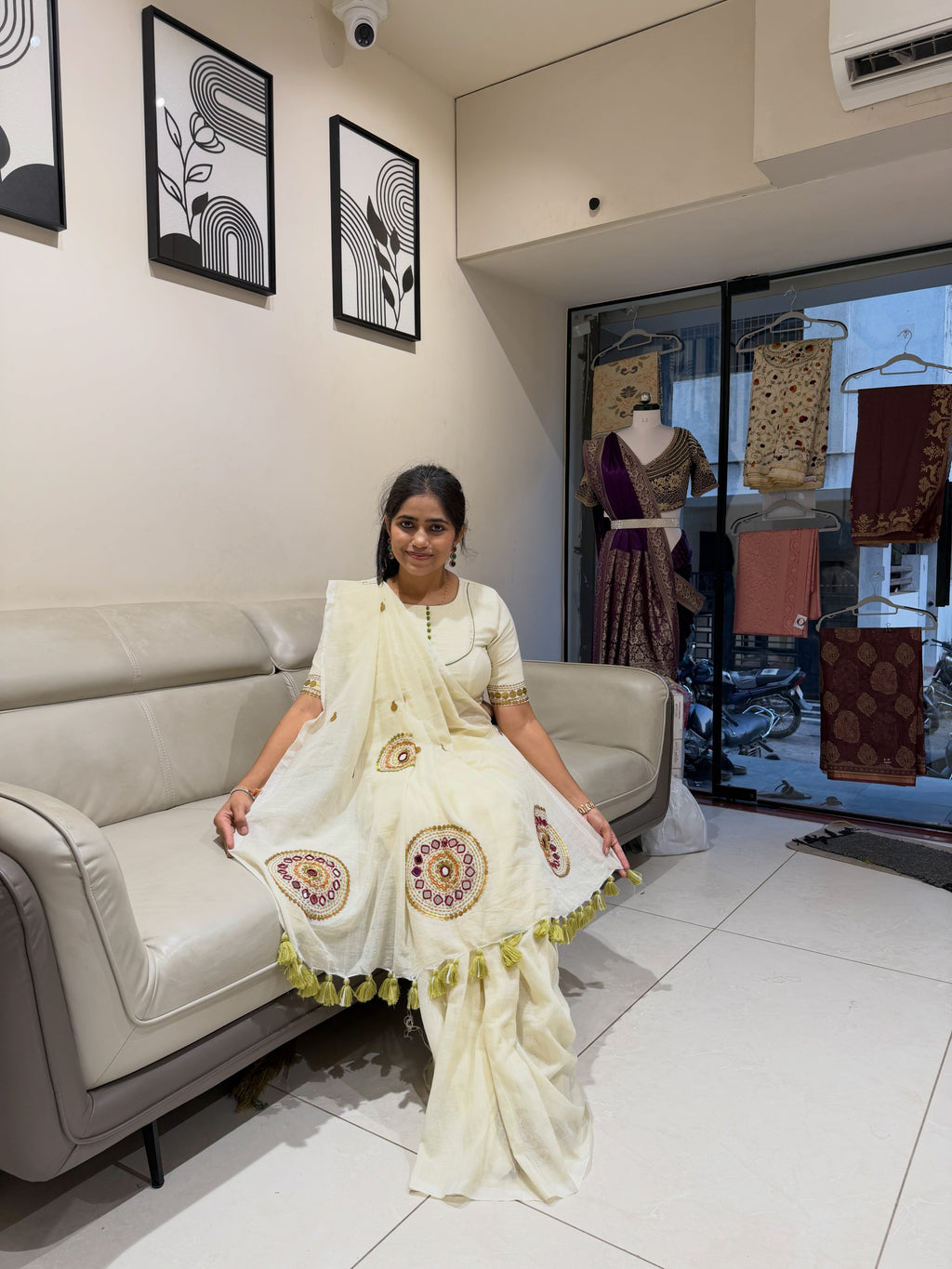 Ivory khadi cotton saree with hand stitched circular motifs and tassel edging - view 12
