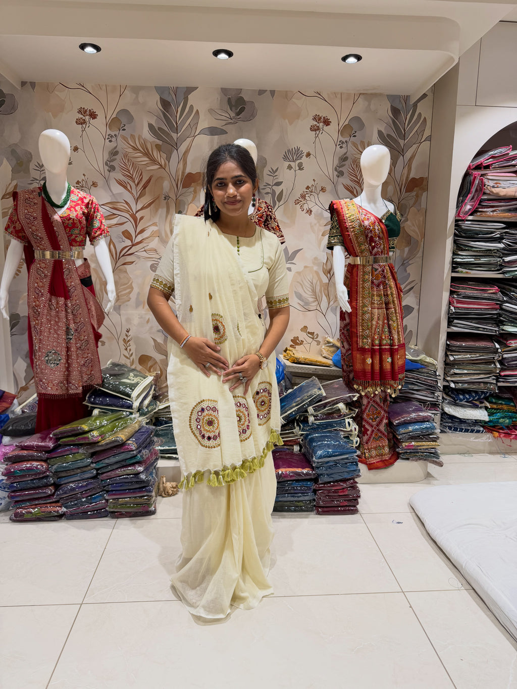 Ivory khadi cotton saree with hand stitched circular motifs and tassel edging - view 13
